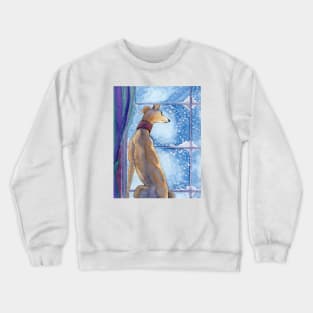 A greyhound dog admires the snowfall from his nice warm seat inside Crewneck Sweatshirt